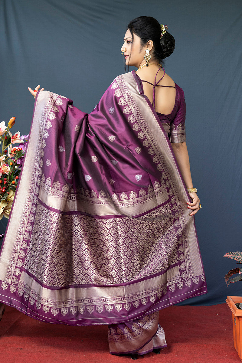 Monjolika Fashion Wine Purple Banarasi Silk Blend Saree with Silver Zari Border & Woven Pallu