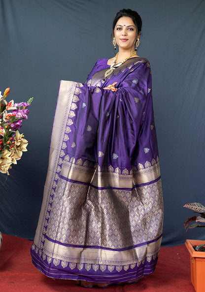 Monjolika Fashion Violet Banarasi Silk Blend Saree with Silver Zari Border & Woven Pallu