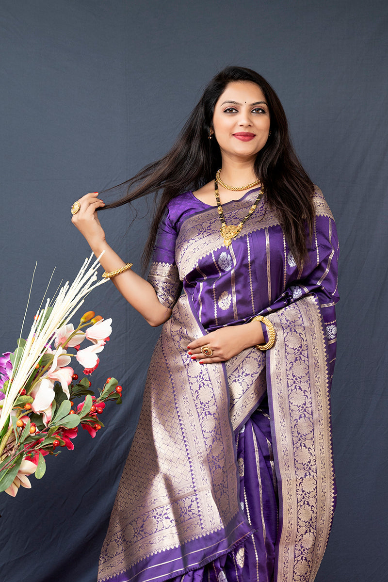 Monjolika Fashion Purple Banarasi Silk Blend Saree With Zari Border & Woven Pallu