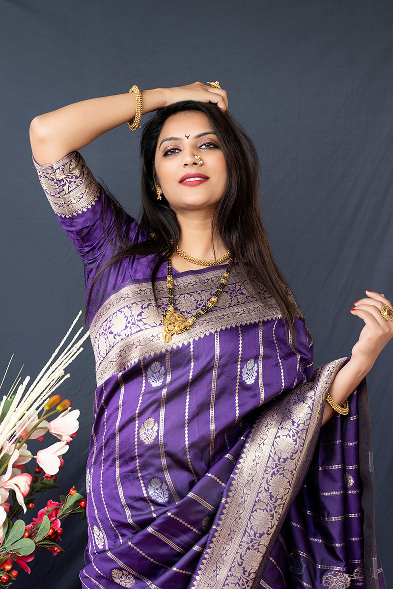 Monjolika Fashion Purple Banarasi Silk Blend Saree With Zari Border & Woven Pallu