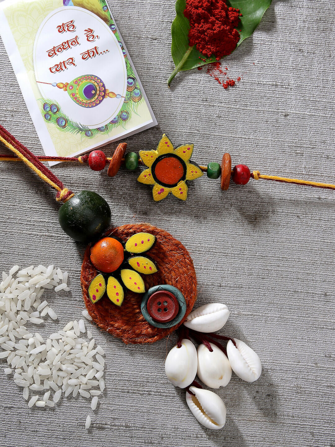 NVR Women & Men Set of 2 Multicolor Sea Shell Handcrafted Bhaiya Bhabhi Rakhi With Roli Chawal