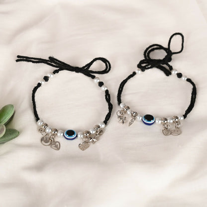 NVR Women Set of 2 Black Evil Eye Rakhi With Roli Chawal