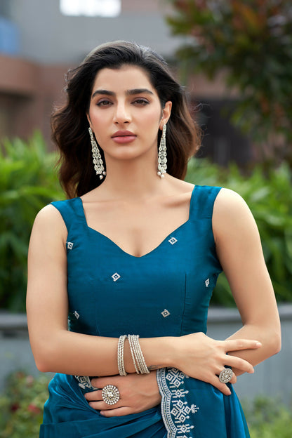 Vastranavya Teal Embroidery Work Shimmer Chiffon Saree with Unstitched Blouse