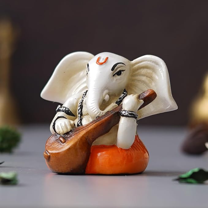 Ecraftindia White & Orange Polyresin Handcrafted Lord Ganesha Idol Playing Veena Musical Instrument