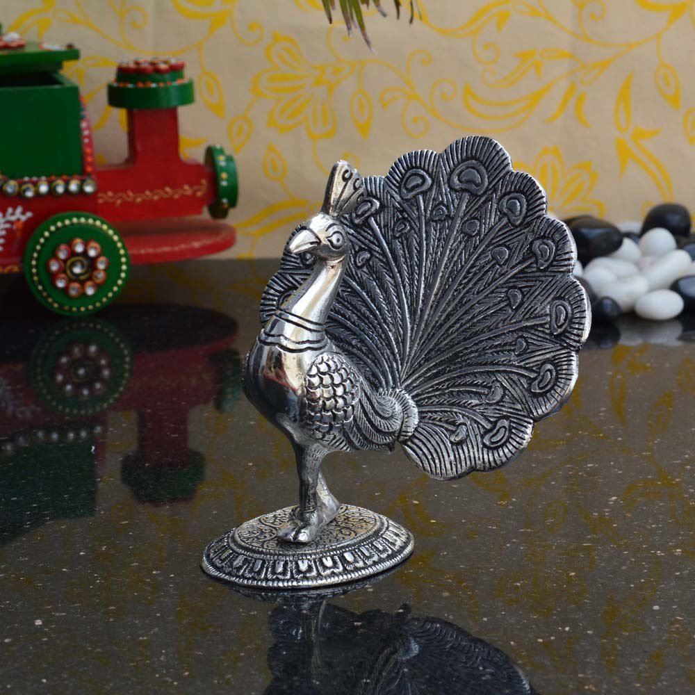 Ecraftindia White Metal Dancing Peocock