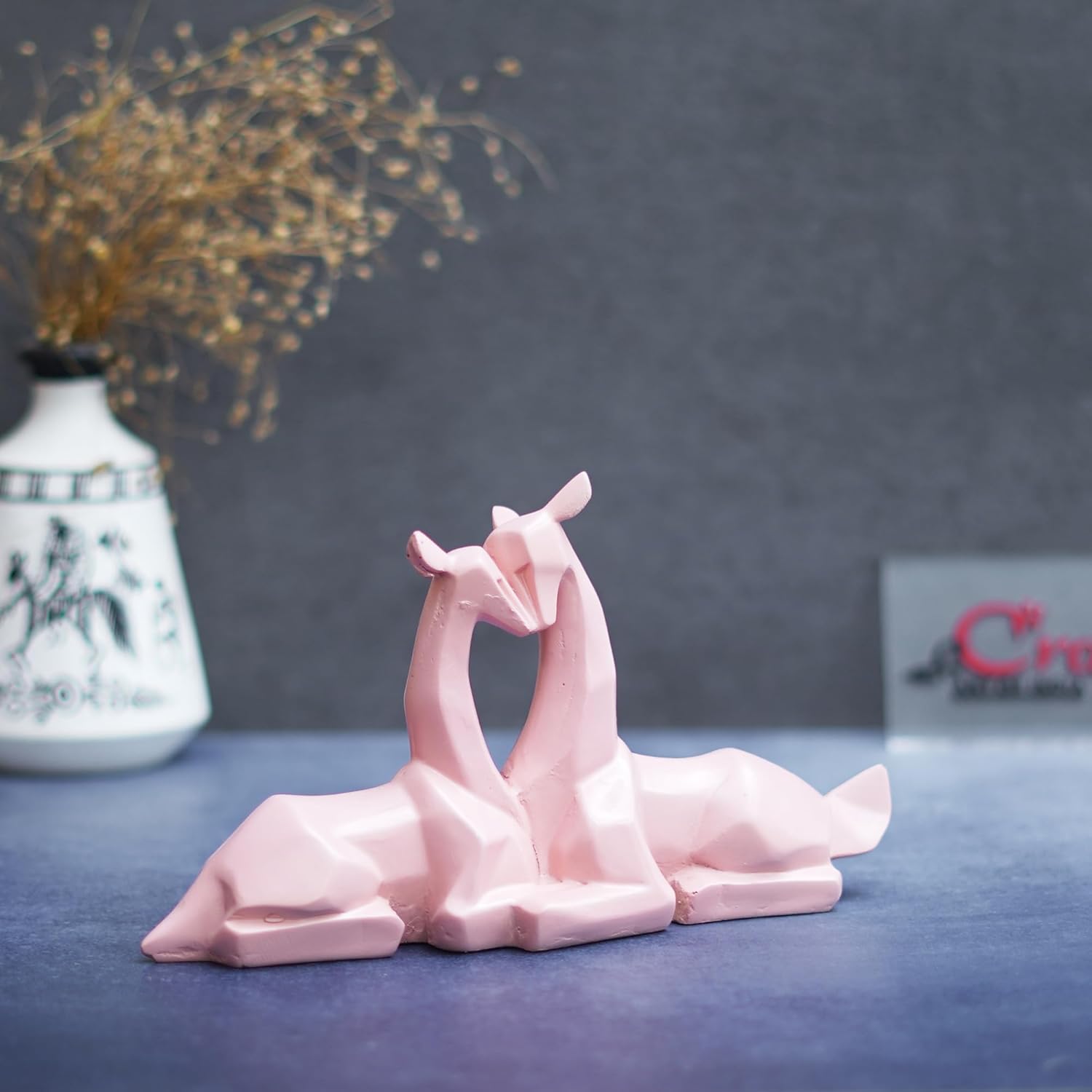 Ecraftindia Set of 2 Pink Polyresin Geometric Hugging Deer Statue Decorative Showpiece