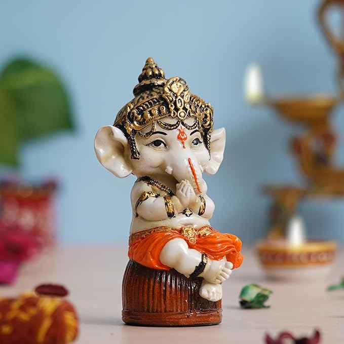 Ecraftindia Orange Polyresin Handcrafted Lord Ganesha Idol Sitting on Rock | God Idol