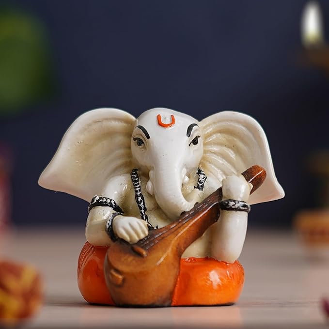 Ecraftindia White & Orange Polyresin Handcrafted Lord Ganesha Idol Playing Veena Musical Instrument