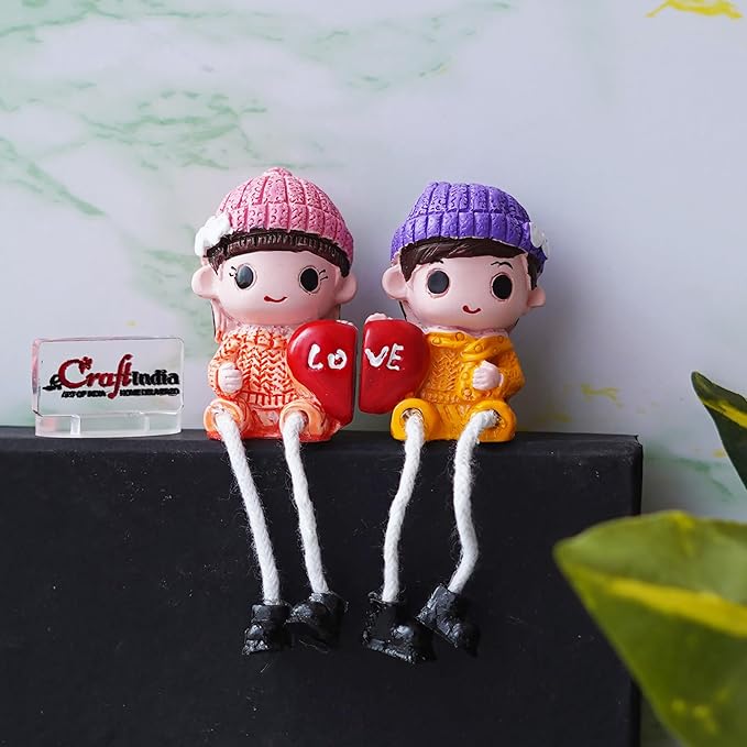 Ecraftindia Cute Boy and Girl Doll Sitting Couple Statue Holding Heart Love Decorative Showpiece