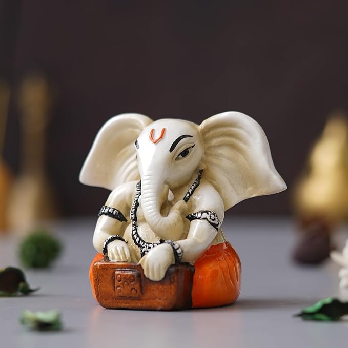Ecraftindia White & Orange Polyresin Handcrafted Lord Ganesha Idol Playing Harmonium Musical Instrument