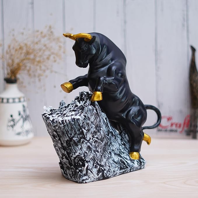 Ecraftindia Black Polyresin Bull Statue With Golden Horns & Climbing on Rock Showpiece
