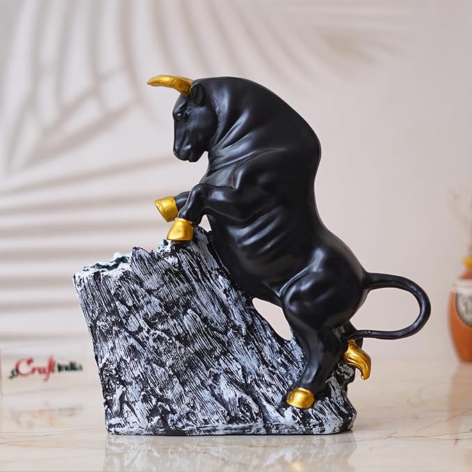 Ecraftindia Black Polyresin Bull Statue With Golden Horns & Climbing on Rock Showpiece