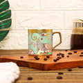 Femora Bone China Gold Tea Cup | Dancing Peahens | 180 Ml