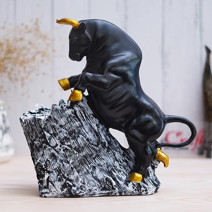 Ecraftindia Black Polyresin Bull Statue With Golden Horns & Climbing on Rock Showpiece