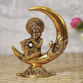 Ecraftindia Golden Metal Handcrafted Lord Krishna Idol Playing Flute and Sitting on Half Moon Decorative Showpiece