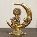 Ecraftindia Golden Metal Handcrafted Lord Krishna Idol Playing Flute and Sitting on Half Moon Decorative Showpiece for Home Decor