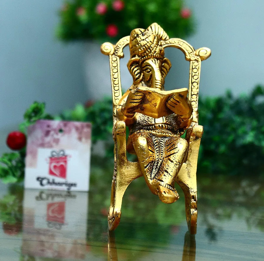 Chhariya Crafts Metal Lord Ganesh Reading Ramayana Statue Ganpati Sitting on Chair With Kuber Diya Idol- 14 Cm
