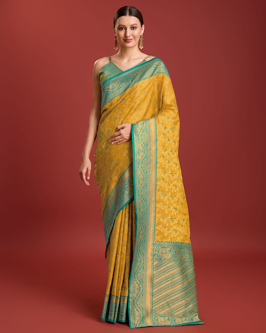 Monjolika Fashion Glamour And Tradition With This Mustard Color Zari Woven Banarasi Tissue Silk Saree