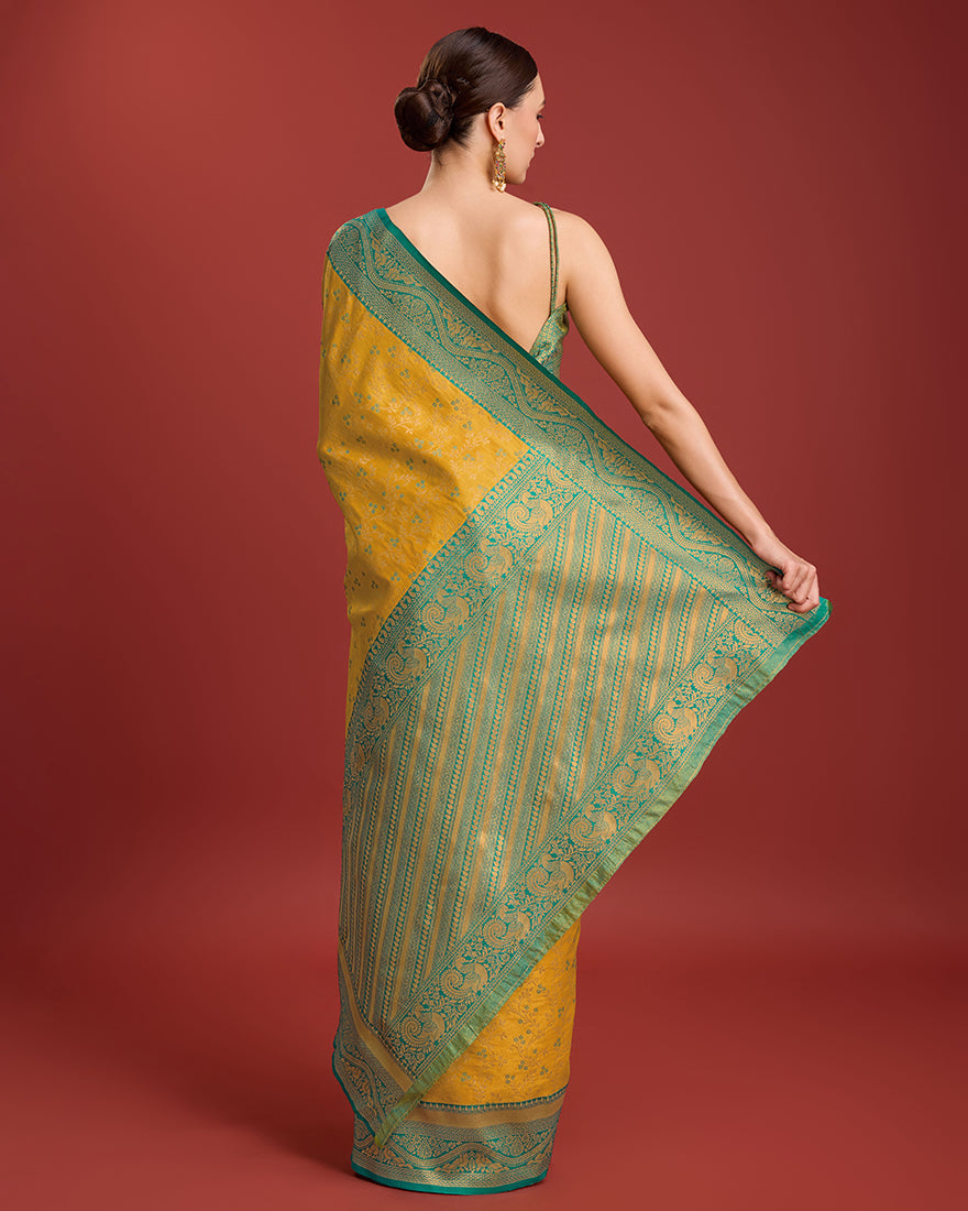 Monjolika Fashion Glamour And Tradition With This Mustard Color Zari Woven Banarasi Tissue Silk Saree