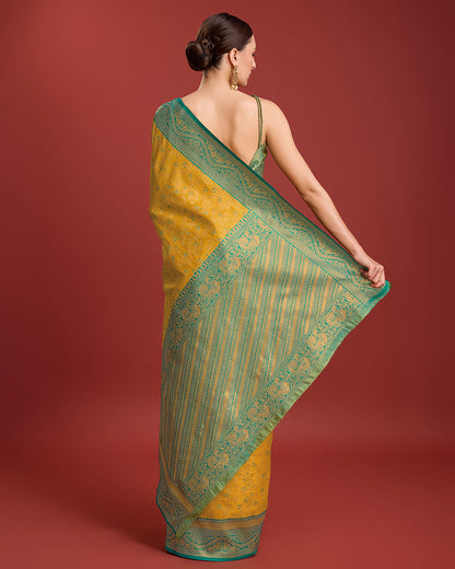 Monjolika Fashion Glamour And Tradition With This Mustard Color Zari Woven Banarasi Tissue Silk Saree