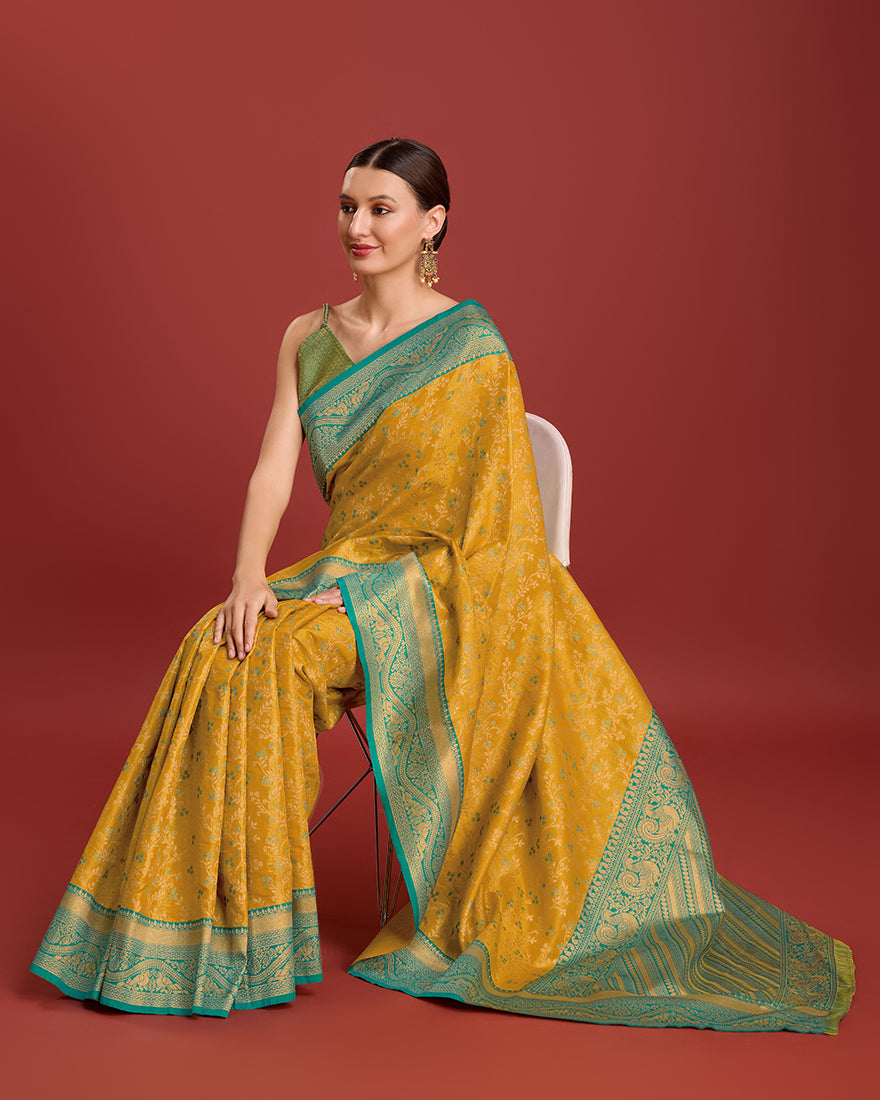 Monjolika Fashion Glamour And Tradition With This Mustard Color Zari Woven Banarasi Tissue Silk Saree