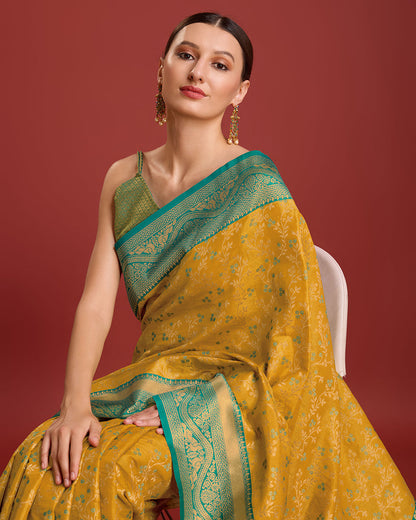 Monjolika Fashion Glamour And Tradition With This Mustard Color Zari Woven Banarasi Tissue Silk Saree
