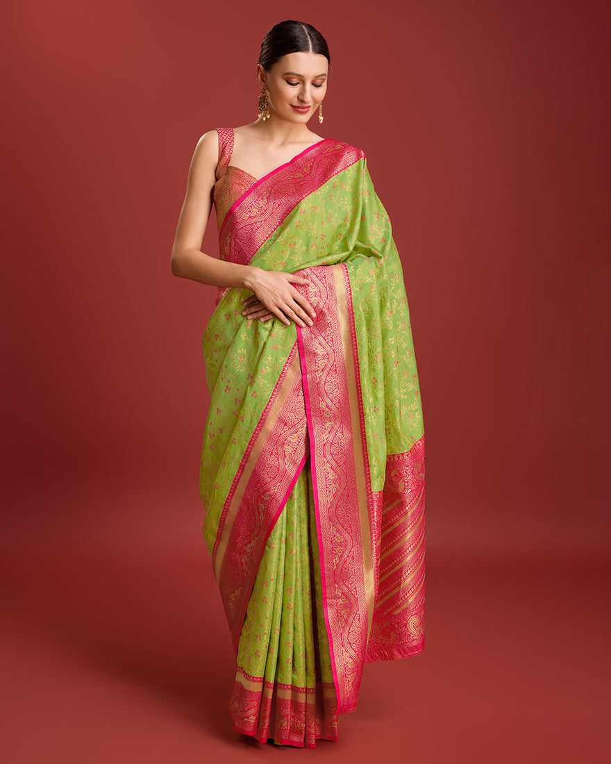 Monjolika Fashion Glamour And Tradition With This Parrot Green Color Zari Woven Banarasi Tissue Silk Saree