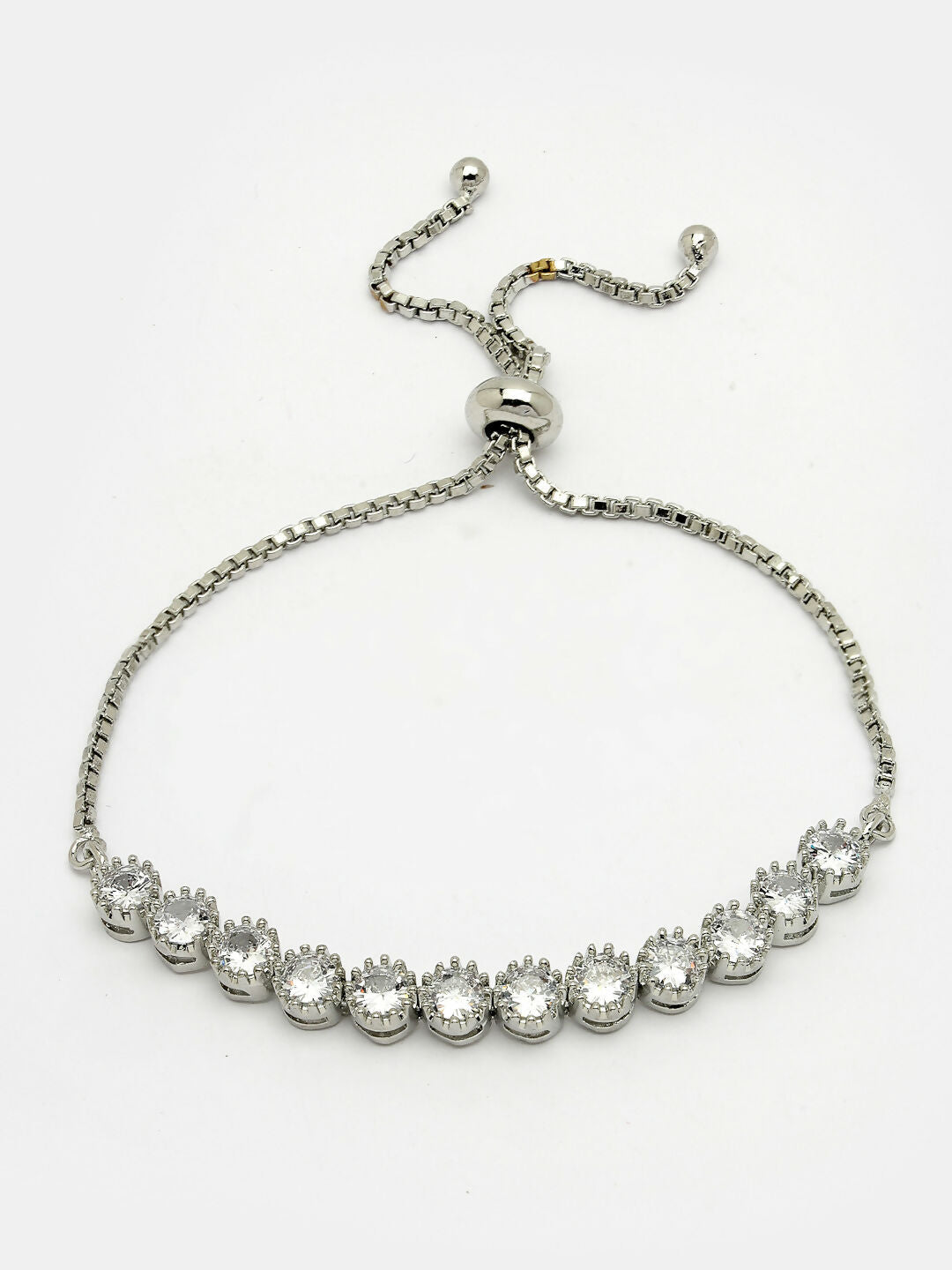 NVR Women Silver-Plated American Diamond Studded Rakhi With Roli Chawal