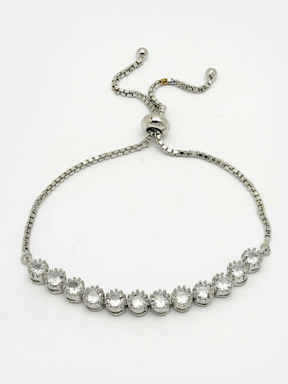 NVR Women Silver-Plated American Diamond Studded Rakhi With Roli Chawal