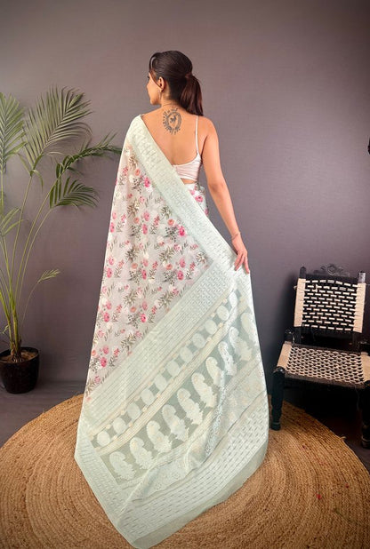 Elora Sky Blue Silk Floral Motifs Coppery Tone Contrast Floral Border Banarasi Saree