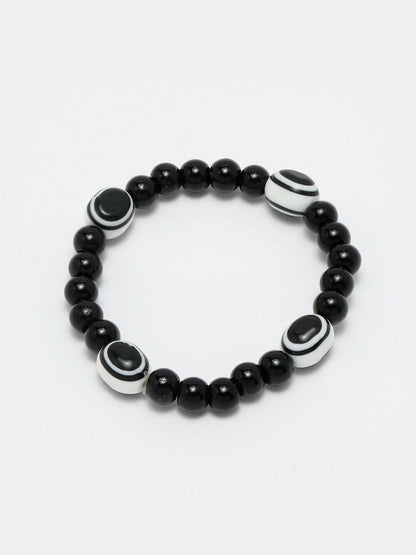 NVR Women & Men Black Evil Eye Elasticated Rakhi With Roli Chawal