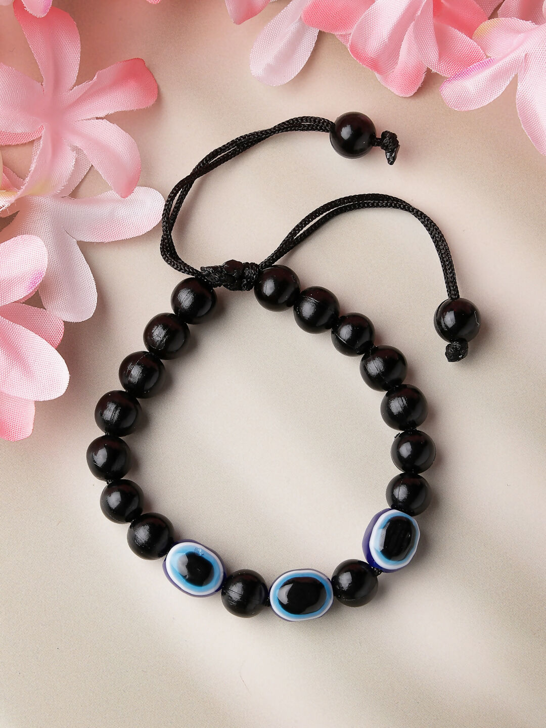NVR Women & Men Set of 2 Black Evil Eye Rakhi With Roli Chawal