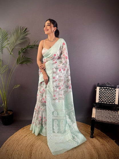 Elora Sky Blue Silk Floral Motifs Coppery Tone Contrast Floral Border Banarasi Saree