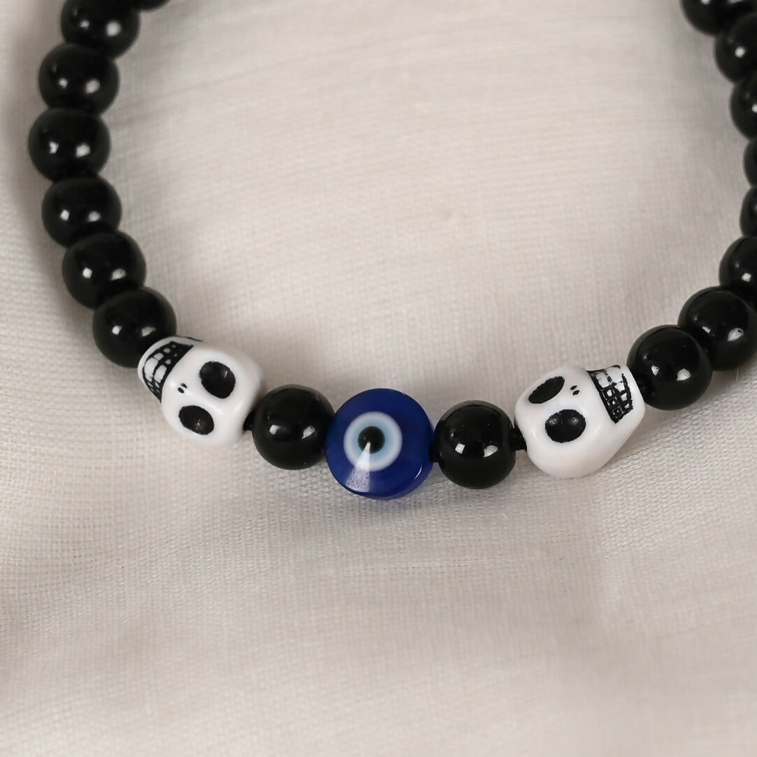 NVR Women & Men Black Evil Eye Rakhi With Roli Chawal