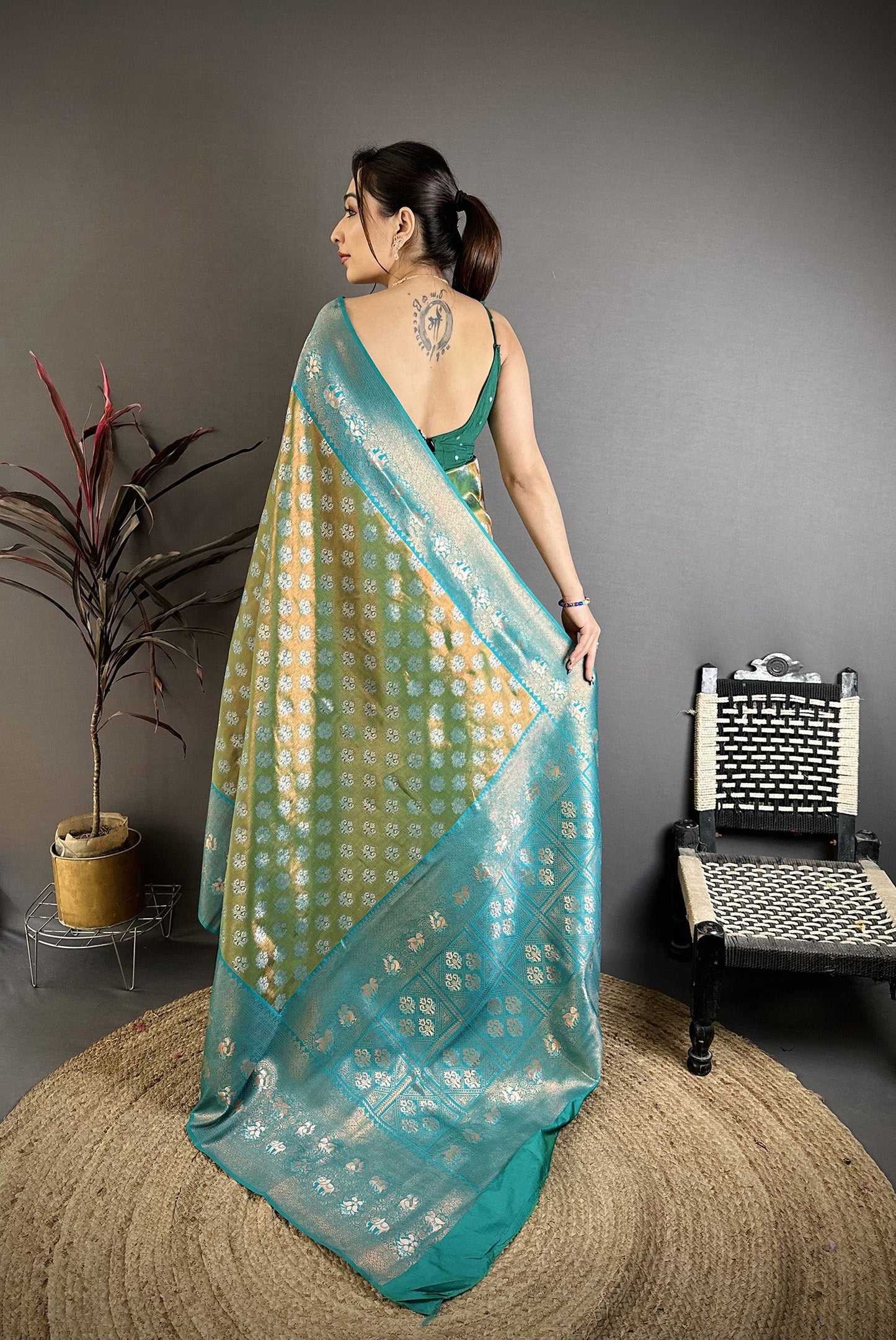 Elora Teal Green Tissue Silk Floral Pattern With Copper Motifs Banarasi Saree