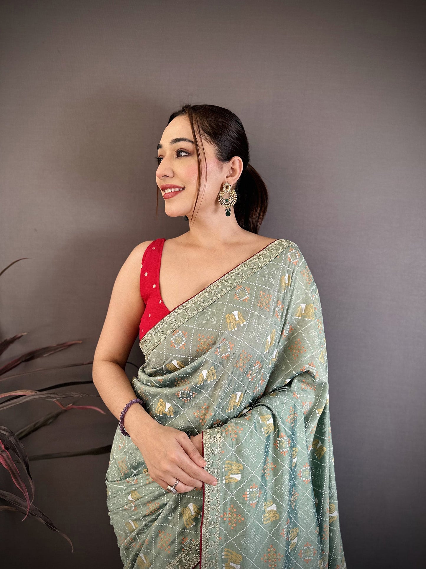 Elora Sea Green Vichitra Silk Animal Motif Foil Print Sequence Embroidery Work Bandhani Saree