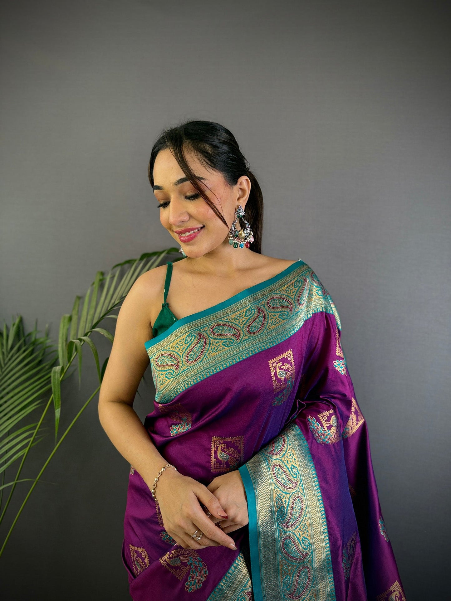 Elora Plum Soft Silk Peacock Pattern Zari Weaving Contrast Border Banarasi Saree