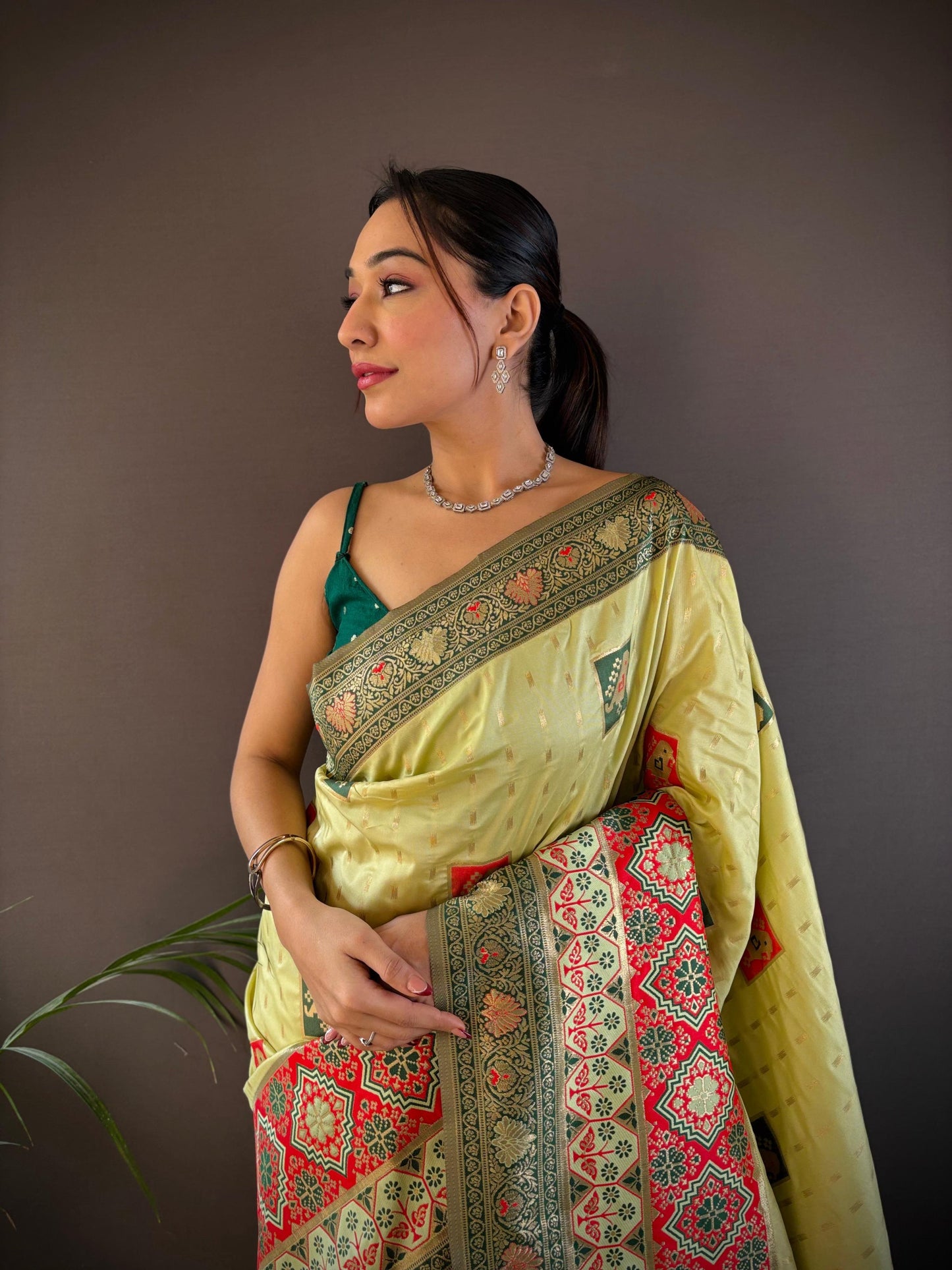 Elora Light Green Soft Silk Small Butti Zari Weaving Contrast Weaving Border Banarasi Saree
