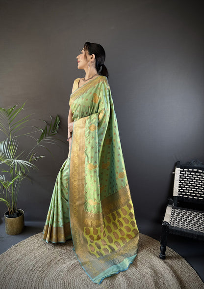 Elora Light Green Soft Silk Woven Copper Zari Weaving Banarasi Saree With Contrast Blouse
