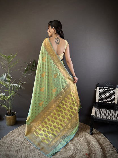 Elora Light Green Soft Silk Woven Copper Zari Weaving Banarasi Saree With Contrast Blouse