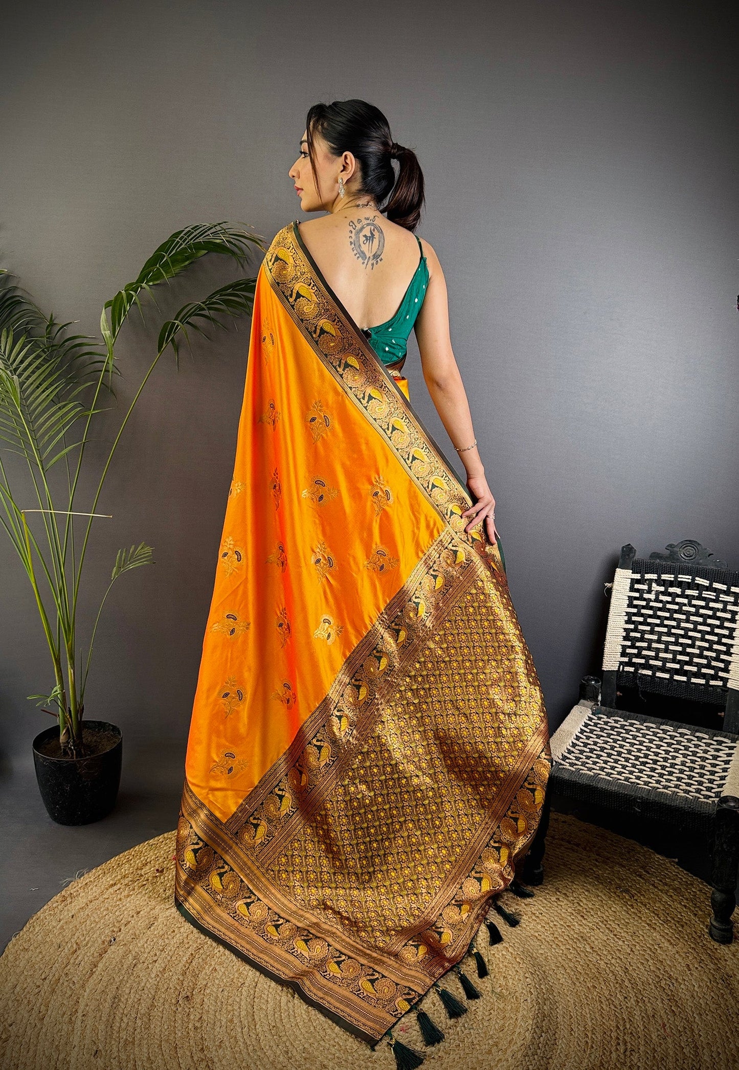 Elora Orange Soft Silk Floral Butta Zari Weaving Banarasi With Peacock Zari Weaving Border