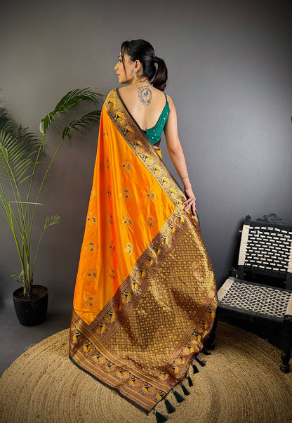 Elora Orange Soft Silk Floral Butta Zari Weaving Banarasi With Peacock Zari Weaving Border