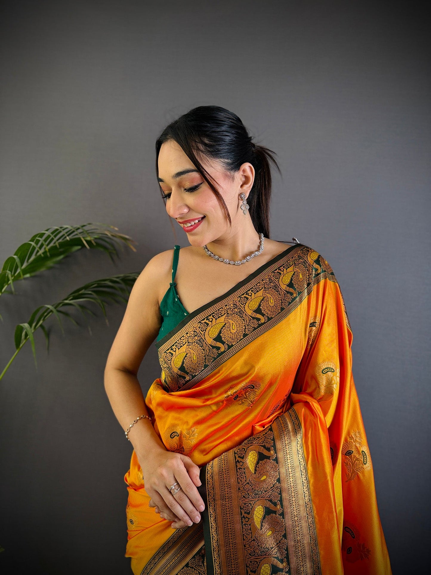Elora Orange Soft Silk Floral Butta Zari Weaving Banarasi With Peacock Zari Weaving Border