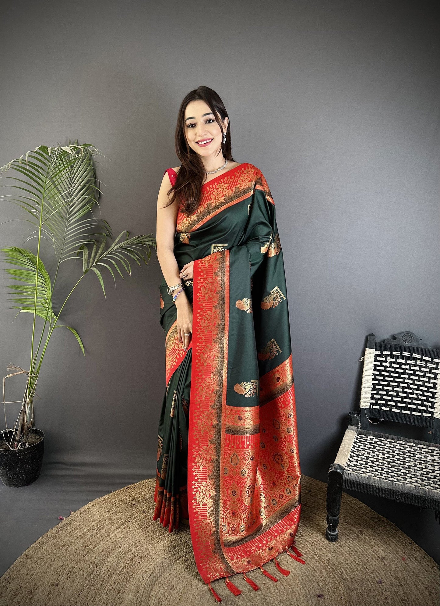 Elora Dark Green Soft Silk Dual Zari Peacock Butta Worked Banarasi Saree