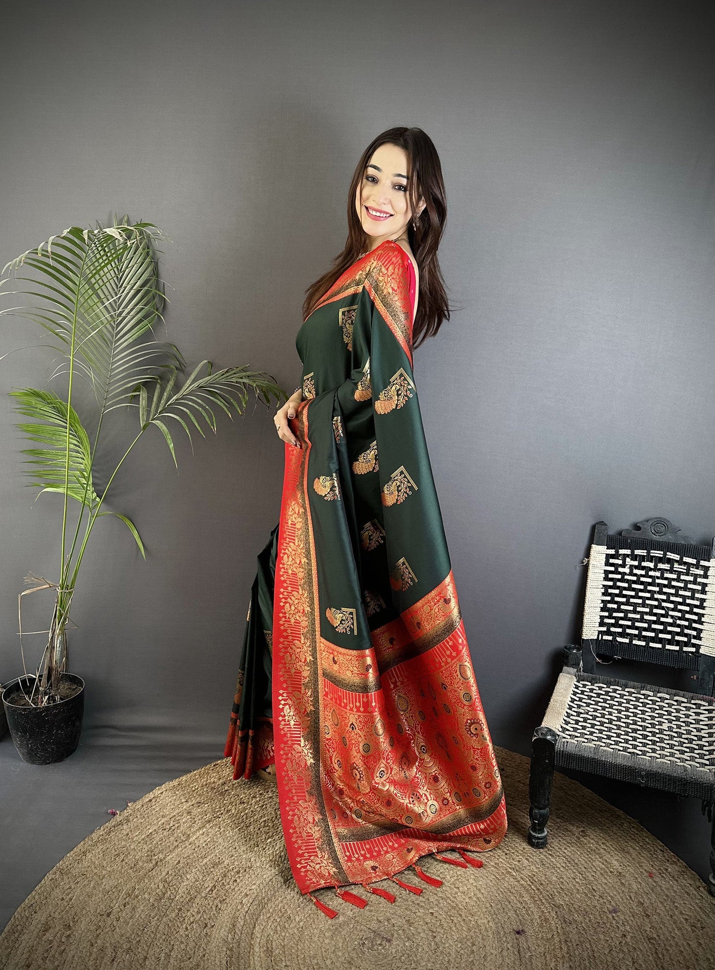 Elora Dark Green Soft Silk Dual Zari Peacock Butta Worked Banarasi Saree