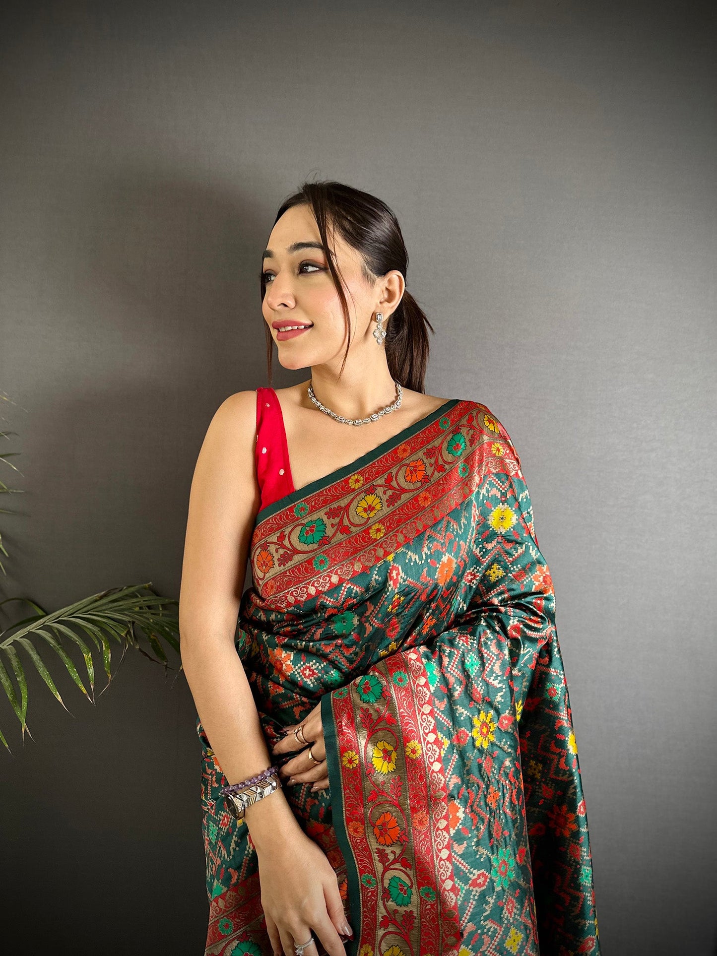 Elora Dark Green Soft Silk Banarasi Zari Woven Saree