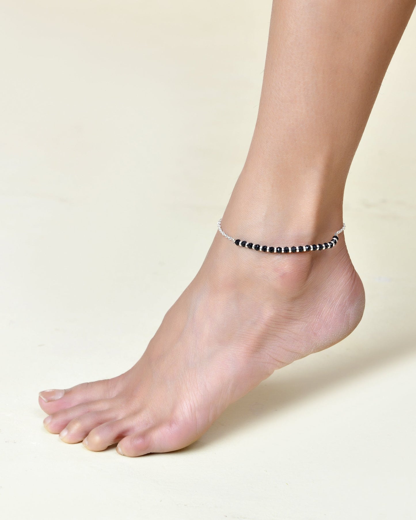 Jewels Nest Elegant Silver-Plated Black Bead Anklet – Traditional & Trendy