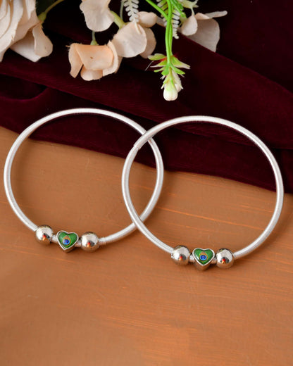 Jewels Nest Set of 2 Silver-Plated Stainless Steel Heart-Shaped Peacock Stone Beaded Anklets