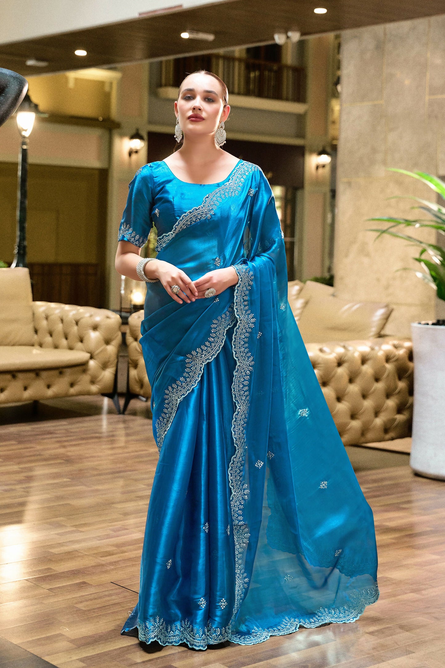 Vastranavya Sea Blue Embroidery Work Shimmer Chiffon Saree with Unstitched Blouse