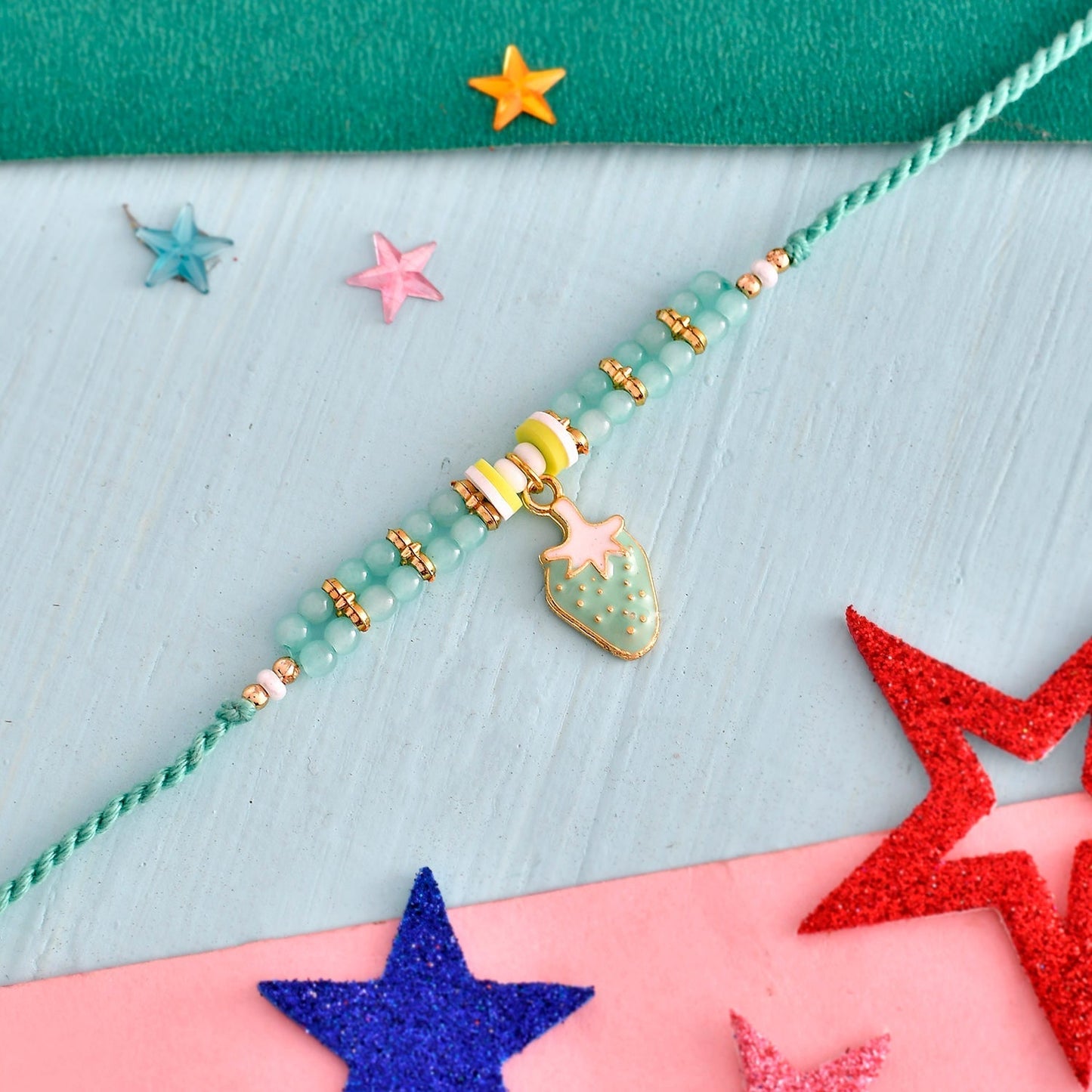 trueBrowns X Voylla Turquoise Beads Kid's Fruit Motif Rakhi For Kids